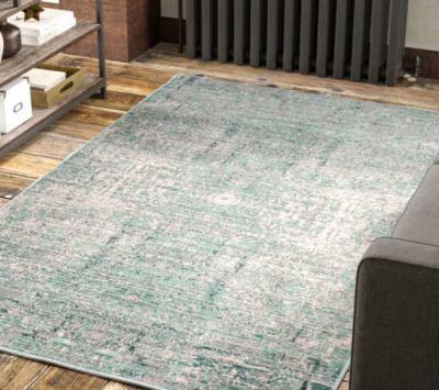 Mailelani Abstract Area Rug in Teal