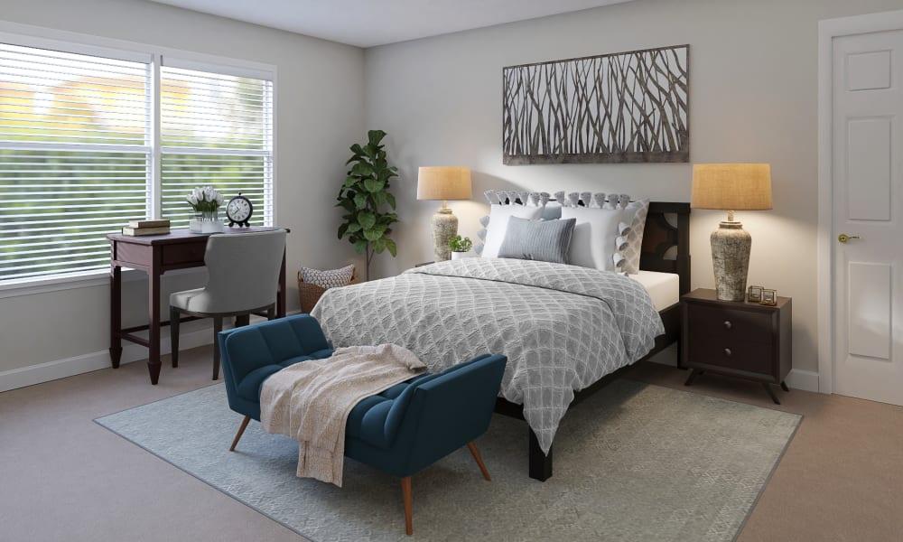 A Transitional Bedroom With A Stylish Home Office 