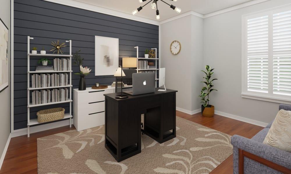 A Charcoal Blue Accent Wall In A Transitional Home Office
