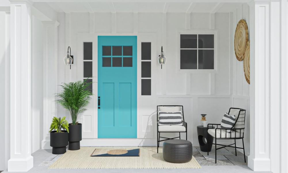 The Perfectly Simple Patio Design Featuring A Teal Door