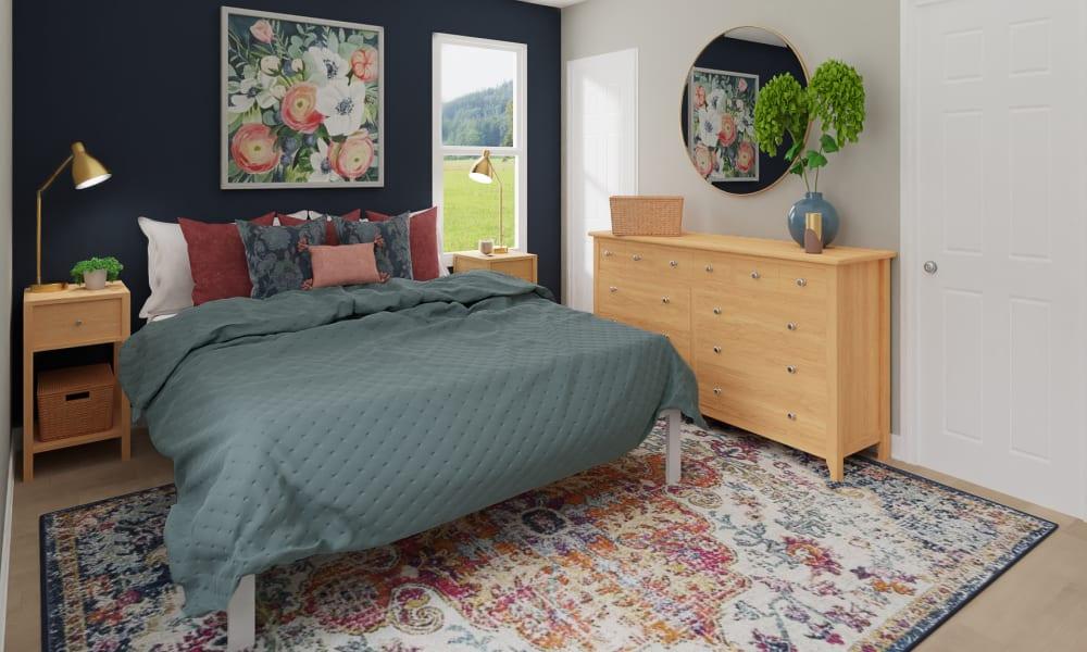 An Eclectic Bedroom Filled With Floral Prints